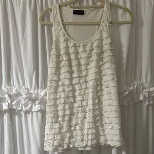 Cream Ruffled Eyelet Tank Top with silver sequin all over the front of it.